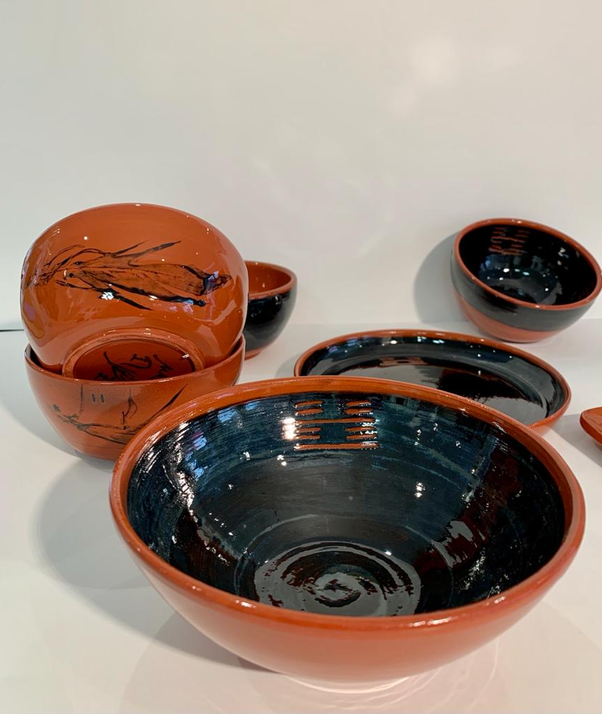 8. Bols trigramme et plume